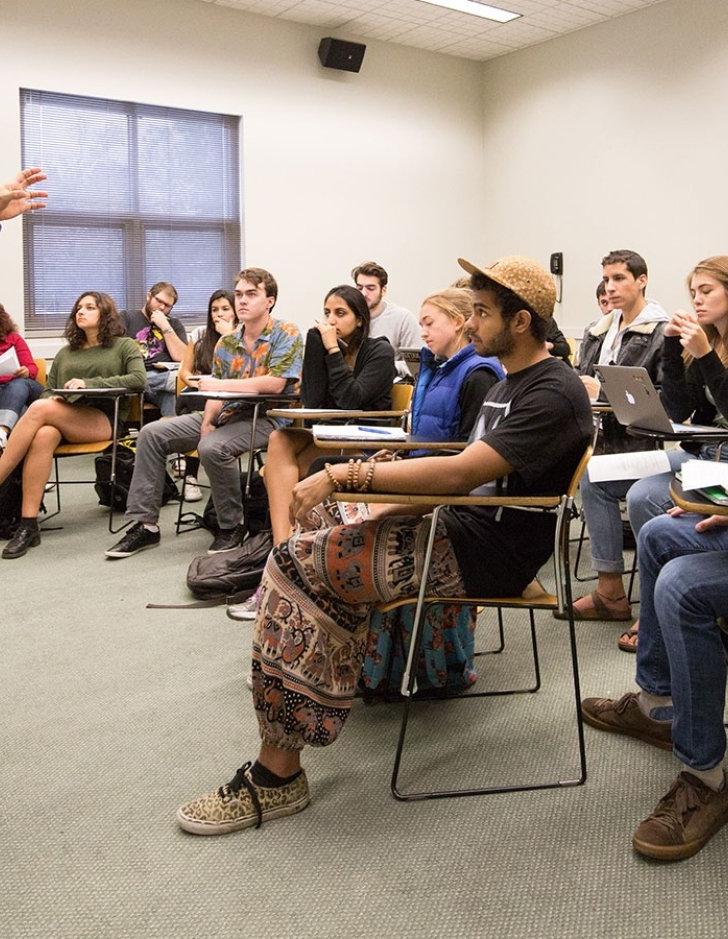 professor alwishah lectures to a group of philosophy students